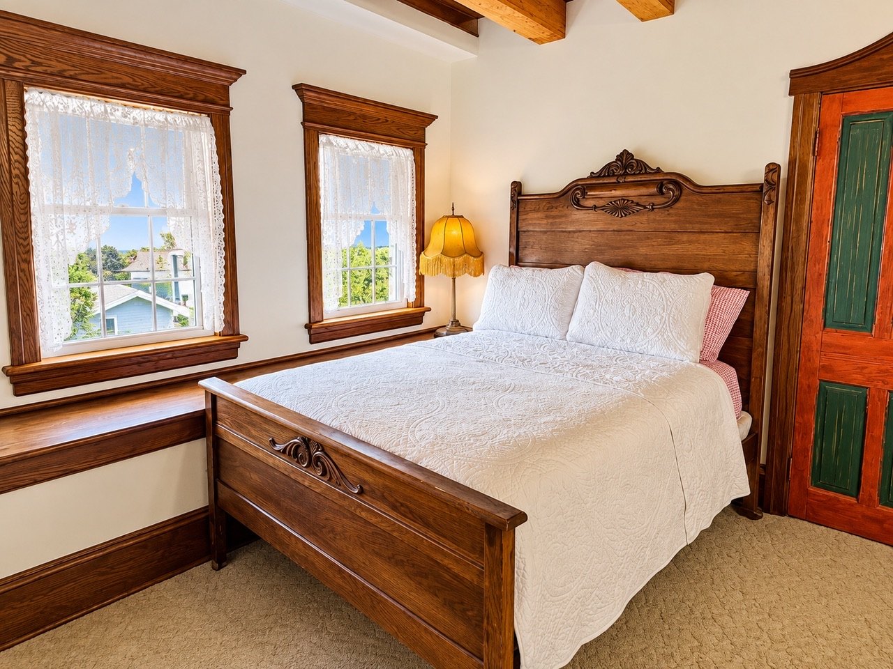 Bedroom with historic woodwork at Aster Shores