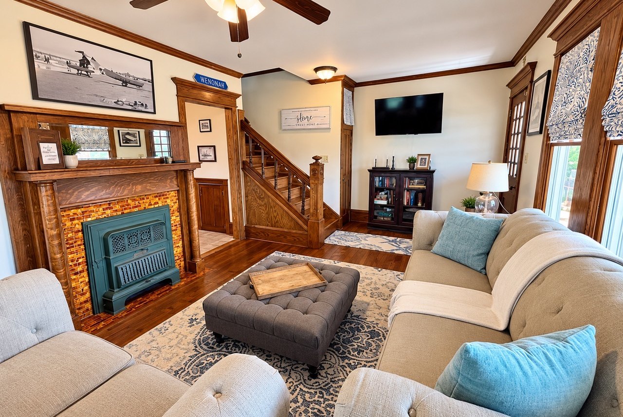 Living room with original fireplace and woodwork
